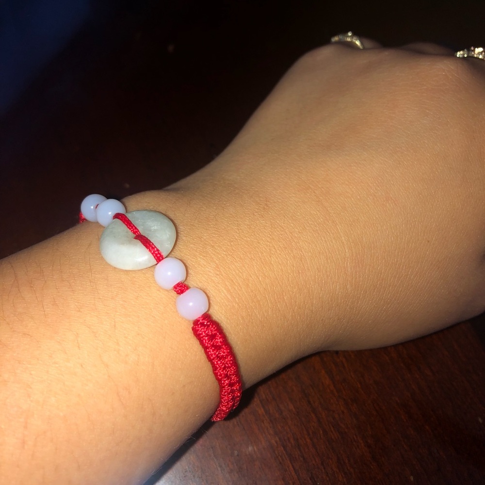 Red rope with jade